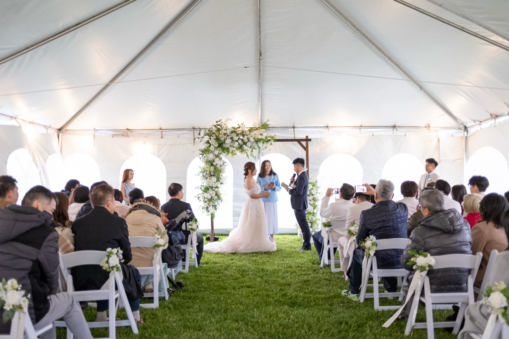 White & Green Ceremony with Wooden Arch