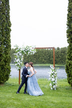 White & Green Ceremony with Wooden Arch